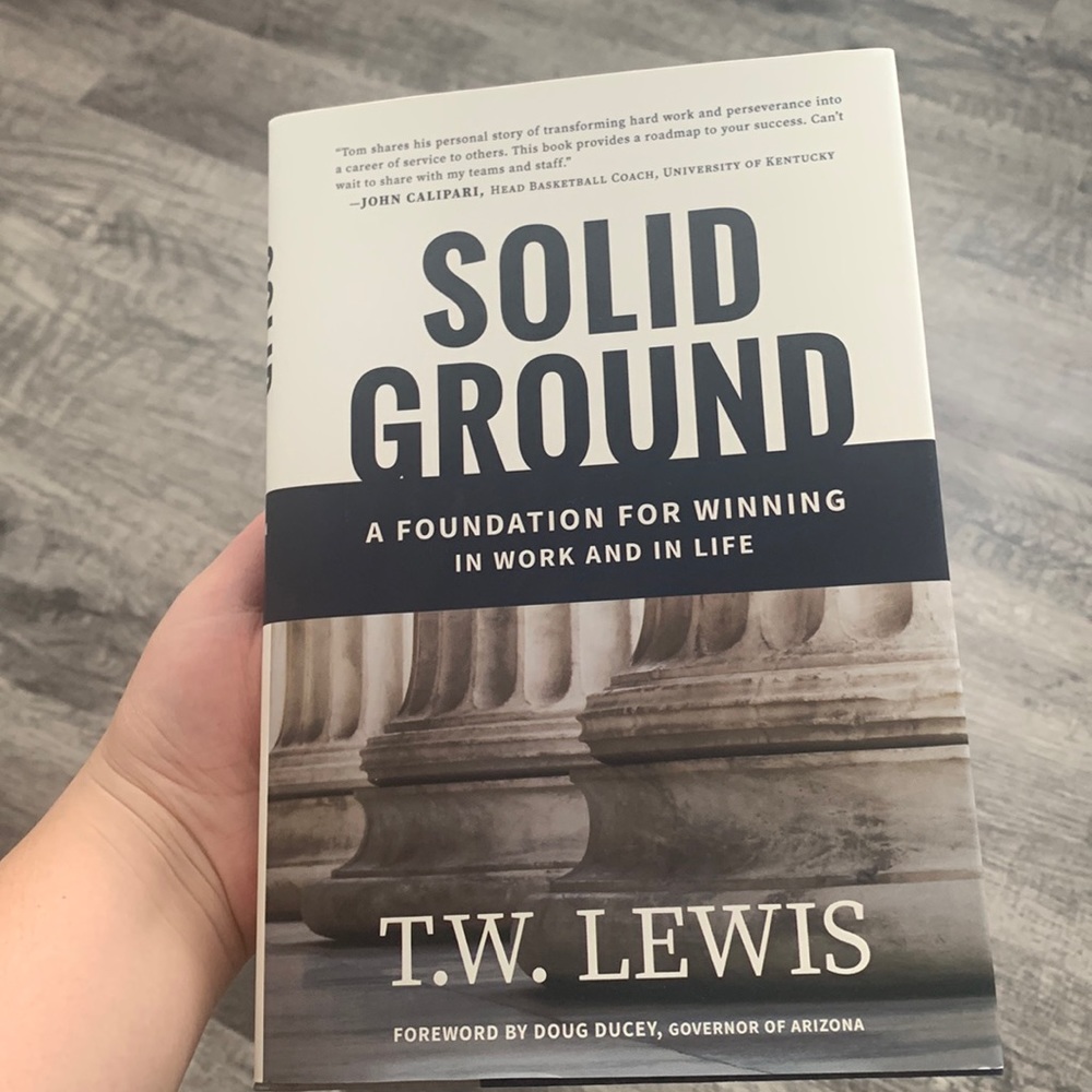 SOLID GROUND: a foundation to winning in work and in life. By T.W. Lewis.